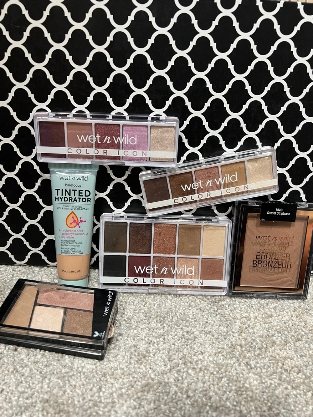 Wet n Wild Box of lightly swatched products